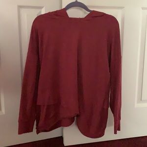 Red,light weight hoodie with a criss-cross bottom